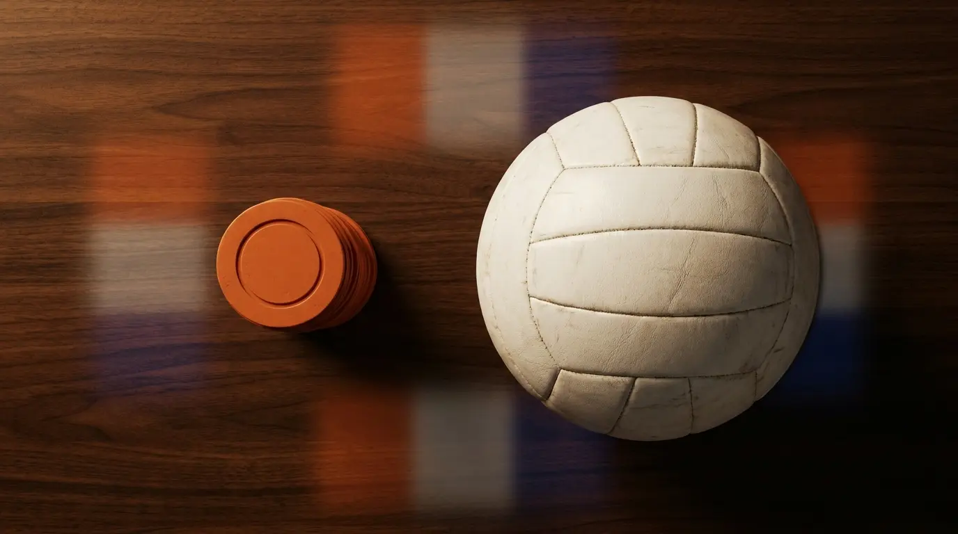 Stapel fiches naast volleybal in Nederlandse kleuren